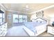 Main bedroom with balcony access offers water views and an en suite bathroom at 514 Harbor N Dr, Indian Rocks Beach, FL 33785