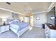 Bright main bedroom with a ceiling fan, and neutral paint offers relaxation and comfort at 514 Harbor N Dr, Indian Rocks Beach, FL 33785