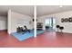 Finished recreation room with exercise equipment, bar and direct access to patio at 514 Harbor N Dr, Indian Rocks Beach, FL 33785