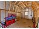 A barn-style storage shed with wooden framing, shelving and an ample storage area at 521 E Lumsden Rd, Brandon, FL 33511