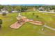 A spacious playground, with slides and swings, is located near green spaces at 5306 Marlwood Ct, Tampa, FL 33624