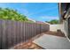 Backyard features a privacy fence, compact landscaping, and ample space for outdoor relaxation at 5306 Marlwood Ct, Tampa, FL 33624