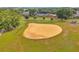 Community ball field with groomed dirt infield and surrounding fence, located near residential homes and amenities at 5306 Marlwood Ct, Tampa, FL 33624