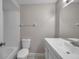 Well-lit bathroom featuring a shower-tub combo, vanity and neutral tones at 5306 Marlwood Ct, Tampa, FL 33624