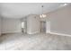 Open concept living room featuring neutral paint, tile floors and lots of light at 5306 Marlwood Ct, Tampa, FL 33624