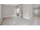 Neutral living room showcases tile floors and built-in desk nook at 5306 Marlwood Ct, Tampa, FL 33624