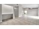 Spacious living room has tile flooring, built in desk and natural light at 5306 Marlwood Ct, Tampa, FL 33624