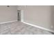 Open living space featuring tile flooring and neutral paint at 5306 Marlwood Ct, Tampa, FL 33624