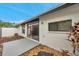 Private backyard patio with sliding glass doors and low maintenance landscaping at 5306 Marlwood Ct, Tampa, FL 33624
