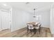 Bright dining room featuring a live edge table and pendant lighting, perfect for Gathering gatherings and entertaining at 622 Cedar Grove Dr, Brandon, FL 33511