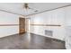 Bright dining area featuring modern dark wood floors and ceiling fan at 6441 27Th N Ave, St Petersburg, FL 33710