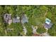 Lush aerial view of neighborhood showcasing the home's location and proximity to greenery and community at 66 Bay Woods Dr, Safety Harbor, FL 34695