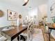 Elegant dining room with a rustic wood table, stylish chairs, and contemporary decor at 66 Bay Woods Dr, Safety Harbor, FL 34695