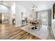 Bright dining room with a wood dining table, comfortable seating, and modern accents at 66 Bay Woods Dr, Safety Harbor, FL 34695