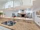 Open concept kitchen featuring granite countertops and a view to the living room at 66 Bay Woods Dr, Safety Harbor, FL 34695