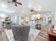 Open-concept living room with vaulted ceilings and seamlessly connects to the kitchen at 66 Bay Woods Dr, Safety Harbor, FL 34695