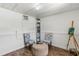 Finished basement with decorative seating, ottoman, shelving, and hardwood flooring at 715 39Th Ne Ave, St Petersburg, FL 33703