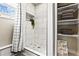 Shower in modern bathroom with subway tile, hexagon tile, and niche at 715 39Th Ne Ave, St Petersburg, FL 33703