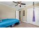 Comfortable bedroom featuring bright light, closet, and hanging swing at 715 39Th Ne Ave, St Petersburg, FL 33703