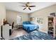 Comfortable bedroom features a ceiling fan, ample natural light, and a spacious layout at 715 39Th Ne Ave, St Petersburg, FL 33703