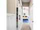 Hallway to the main bedroom features barn door access to a walk-in closet at 715 39Th Ne Ave, St Petersburg, FL 33703