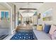 Spacious living room with multiple access points and a combined dining area at 715 39Th Ne Ave, St Petersburg, FL 33703