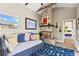 Cozy living room featuring a stone fireplace, comfortable daybed, and stylish decor at 715 39Th Ne Ave, St Petersburg, FL 33703