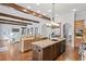 Gourmet kitchen featuring dual islands, custom cabinetry, and stainless steel appliances at 7713 Still Lakes Dr, Odessa, FL 33556