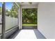 Screened patio offers views of the lush, private backyard and landscaping at 7725 Tangle Rush Dr, Gibsonton, FL 33534