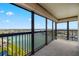 This spacious balcony features black railings and stunning views of the intercoastal waterway at 9415 Blind Pass Rd # 1201, St Pete Beach, FL 33706