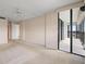 Bedroom with lots of natural light and access to a balcony at 9415 Blind Pass Rd # 1201, St Pete Beach, FL 33706