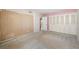 Bedroom featuring wallpaper, closet and access to other rooms at 9415 Blind Pass Rd # 1201, St Pete Beach, FL 33706