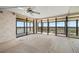 Bright living room with access to balcony offering panoramic water and city views at 9415 Blind Pass Rd # 1201, St Pete Beach, FL 33706