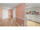 View of the combined living room and kitchen featuring tile floors at 9415 Blind Pass Rd # 1201, St Pete Beach, FL 33706
