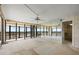 Open living area, with a ceiling fan and sliding glass doors to the intercoastal waterway at 9415 Blind Pass Rd # 1201, St Pete Beach, FL 33706