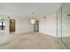Spacious living area featuring large windows and great view of the intercoastal waterway at 9415 Blind Pass Rd # 1201, St Pete Beach, FL 33706