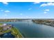 Breathtaking aerial view of a waterway winding through residential areas on a sunny day at 9415 Blind Pass Rd # 1201, St Pete Beach, FL 33706