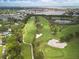 Picturesque golf course community with sand bunkers, lush greens, and bay views at 944 31St Ne Ter, St Petersburg, FL 33704