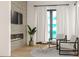 Relaxing living room showcases a fireplace, contemporary seating, and bright natural light at 944 31St Ne Ter, St Petersburg, FL 33704
