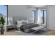 Bright main bedroom boasts large windows, stylish furniture, and a serene atmosphere at 944 31St Ne Ter, St Petersburg, FL 33704