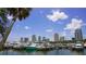 Picturesque marina featuring an array of boats docked against a backdrop of city skyline at 944 31St Ne Ter, St Petersburg, FL 33704