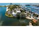 Beautiful aerial view of a waterfront property with marina, parking, and mature trees at 100 1St N Ave # 2207, St Petersburg, FL 33701
