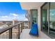 Relaxing balcony with a comfortable lounge chair and stunning city views at 100 1St N Ave # 2207, St Petersburg, FL 33701