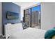 Bedroom with large windows, light walls, and a stunning city view at 100 1St N Ave # 2207, St Petersburg, FL 33701
