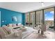 Bright living room with modern furniture, a city view, and stylish decor at 100 1St N Ave # 2207, St Petersburg, FL 33701