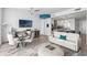Cozy living space featuring modern decor, a dining area, and access to a full kitchen at 100 1St N Ave # 2207, St Petersburg, FL 33701
