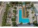 Beautiful aerial view of a large pool area with tropical landscaping and lounge seating at 100 1St N Ave # 2207, St Petersburg, FL 33701