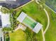 Aerial view of the shuffleboard courts and picnic area by the water at 100 Bluff View Dr # 404C, Belleair Bluffs, FL 33770