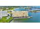 Scenic waterfront condo featuring convenient parking, green spaces, and direct water access at 100 Bluff View Dr # 404C, Belleair Bluffs, FL 33770