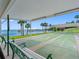 Covered shuffleboard courts with waterfront views and benches for relaxing at 100 Bluff View Dr # 404C, Belleair Bluffs, FL 33770